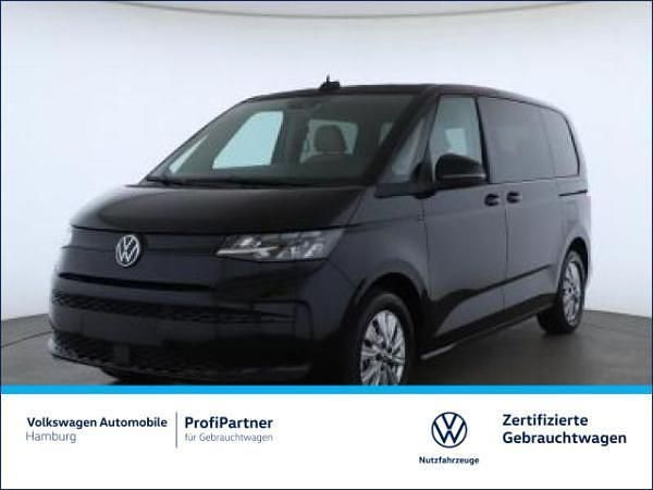 Schwarz (2t deep black perleffekt) Gebraucht 2024 VW Multivan Van | 52.889 € (Fairer Preis) - Bild 1/4