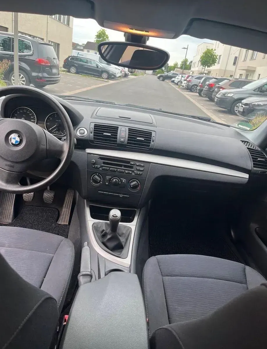 Gebraucht BMW 116 122 PS (89 kW) 2010 Schwarz Kleinwagen