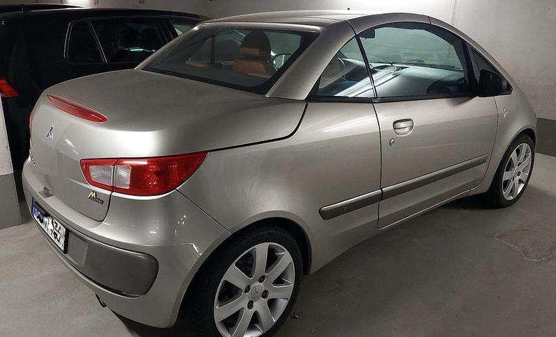 Second-hand Mitsubishi Colt Invite 109 CP (80 kW) 2008 Argintiu Cabrio