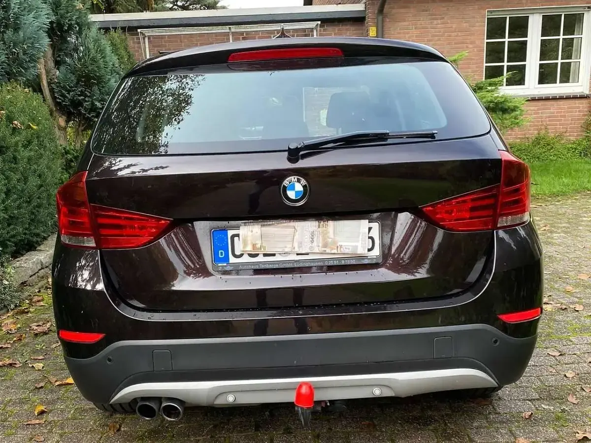 Używany BMW X1 184 KM (135 kW) 2014 Brązowy SUV