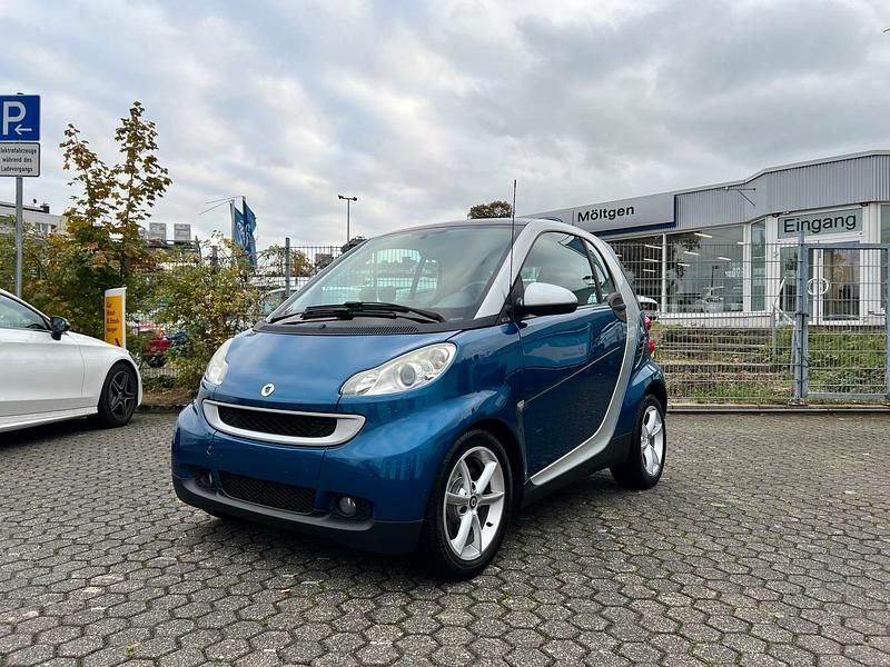 Blau Gebraucht 2009 Smart ForTwo Coupé Kleinwagen | 4.100 € (Fairer Preis) - Bild 1/4