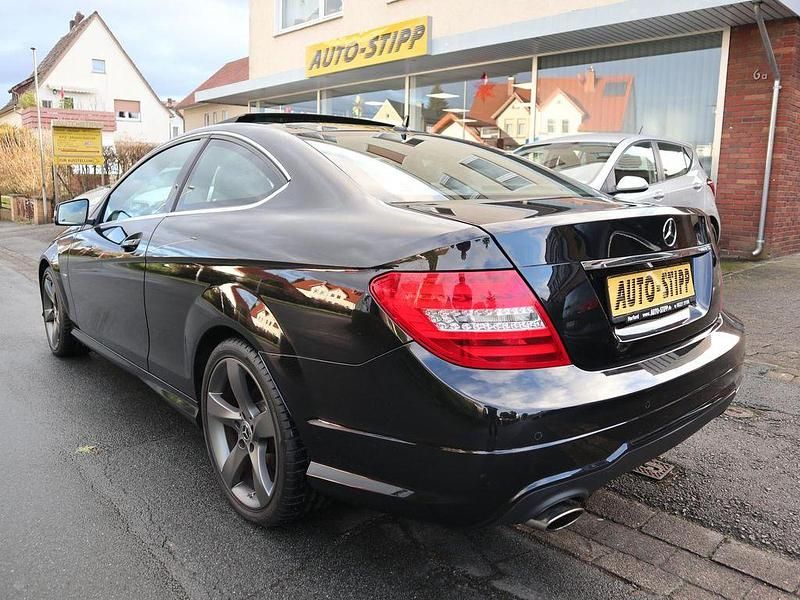 Gebraucht Mercedes C180 AMG 156 PS (114 kW) 2015 Obsidianschwarz (metallic) Coupé