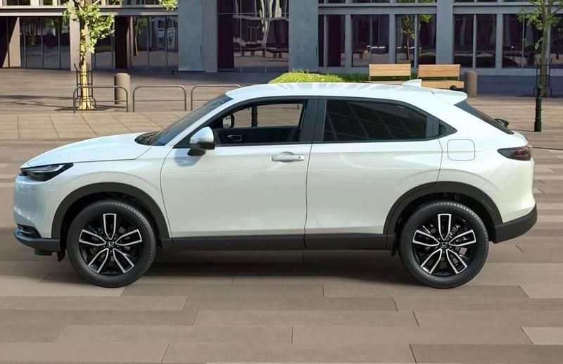 Premium sunlight white ... Neu 2025 Honda HR-V Elegance SUV | 30.898 € (Fairer Preis) - Bild 1/3