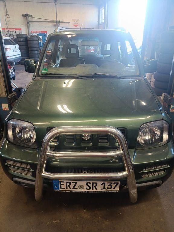 Grün Gebraucht 2010 Suzuki Jimny SUV | 5.900 € (Guter Preis) - Bild 1/4