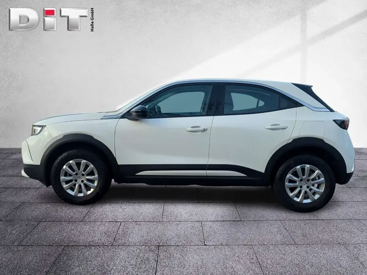 Gebraucht Opel Mokka Enjoy 131 PS (96 kW) 2023 Lack weiss banquise/typ aussenverkleidun (metallic) SUV