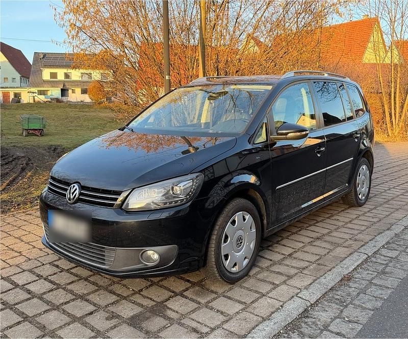 Schwarz Gebraucht 2010 VW Touran Van / Kleinbus | 5.499 € (Fairer Preis) - Bild 1/4