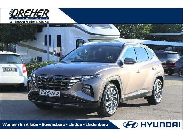 Silky bronze Gebraucht 2021 Hyundai Tucson Trend SUV | 25.490 € (Fairer Preis) - Bild 1/4