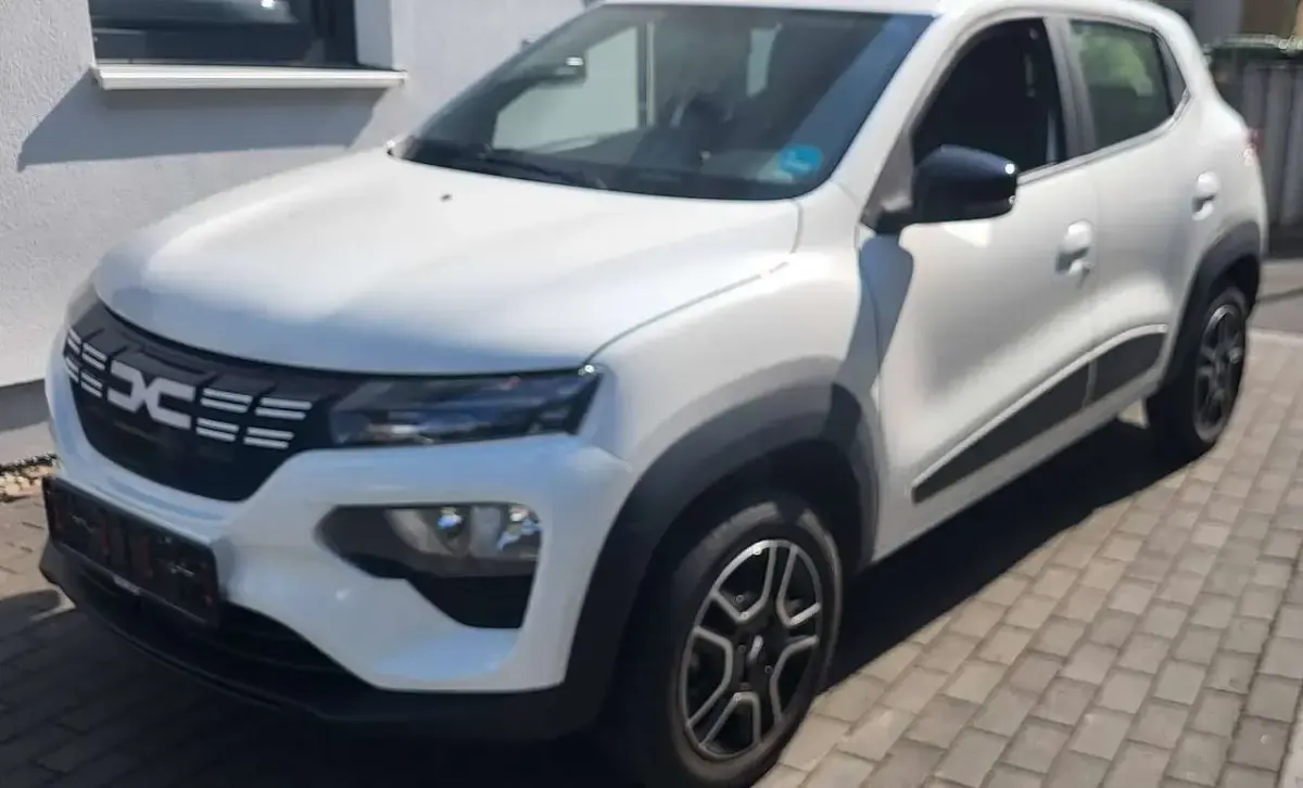 Gebraucht Dacia Spring Essentiel 33 kW (45 PS) 2023 Polarweiss Kleinwagen