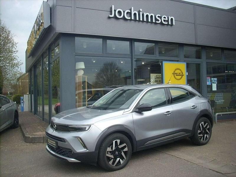 Kontrast grau/quarz silber Gebraucht 2022 Opel Mokka-e Elegance SUV | 23.800 € (Teuer) - Bild 1/4