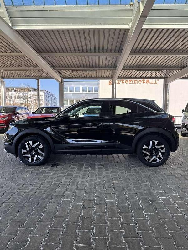 Gebraucht Opel Mokka-e Elegance 100 kW (136 PS) 2022 Diamant schwarz/karbon schwarz SUV