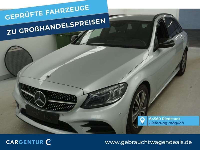 Iridiumsilber Gebraucht 2021 Mercedes C220 AMG line Kombi | 21.189 € - Bild 1/2