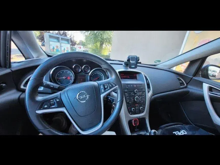 Second-hand Opel Astra Edition 101 CP (74 kW) 2012 Gri Berlinǎ