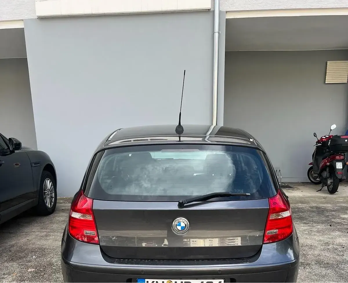 Używany BMW 116 122 KM (89 kW) 2008 Szary Hatchback