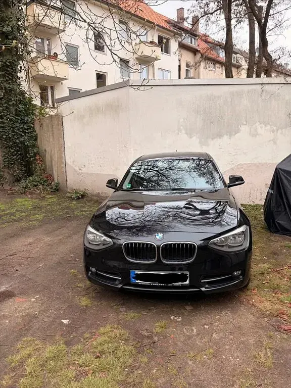 Gebraucht BMW 118 Sport Line 170 PS (125 kW) 2011 Schwarz Kleinwagen