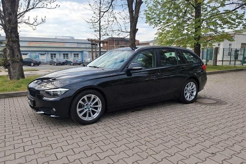 Second-hand BMW 318 143 CP (105 kW) 2014 Negru Break