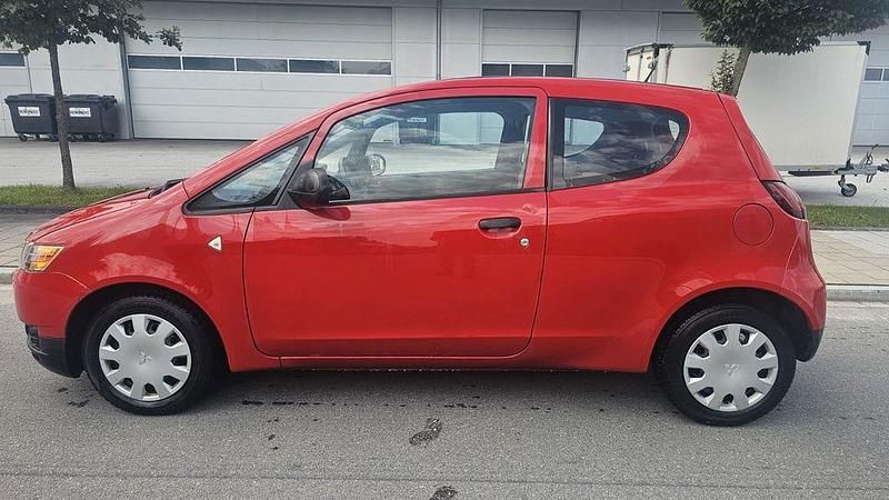 Gebraucht Mitsubishi Colt Basis 75 PS (55 kW) 2010 Rot Kleinwagen