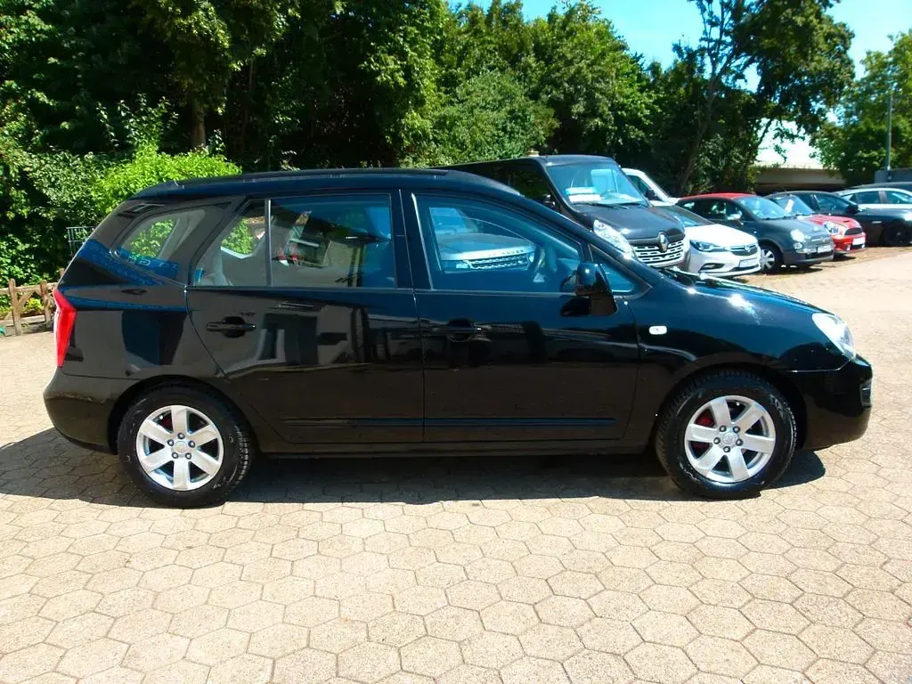 Gebraucht Kia Carens LX 140 PS (102 kW) 2009 Schwarz Van / Kleinbus