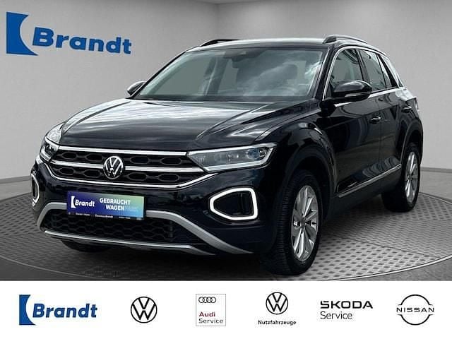 Deep black perleffekt (metallic) Gebraucht 2022 VW T-Roc Style SUV | 26.790 € (Guter Preis) - Bild 1/3