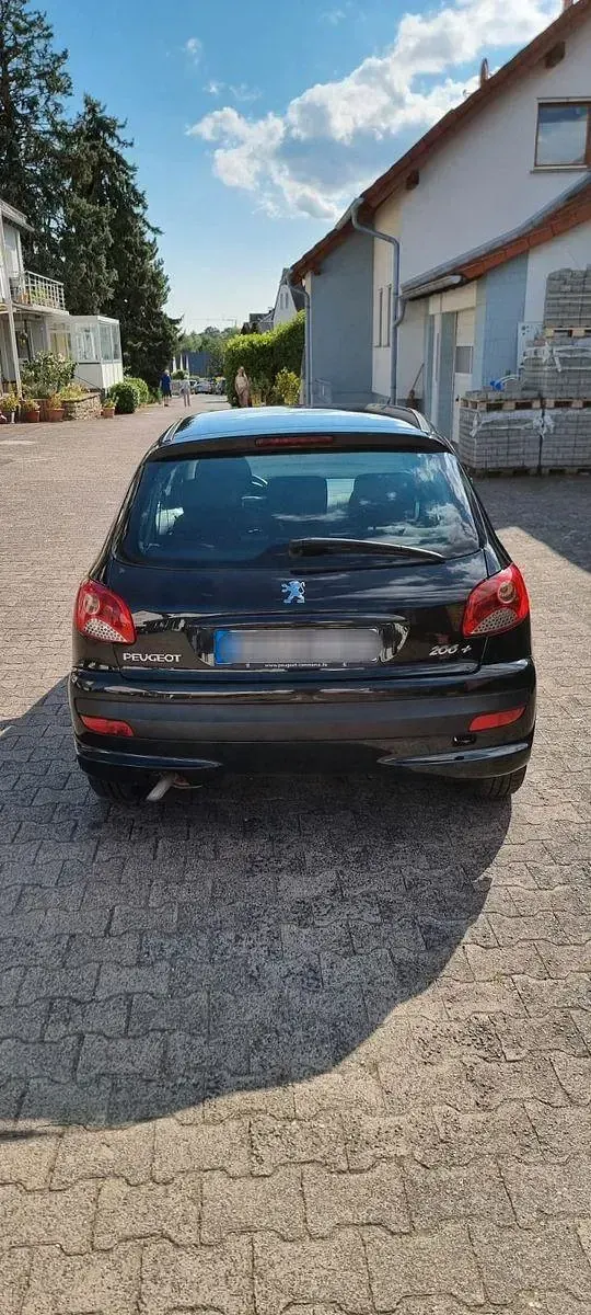 Gebraucht Peugeot 206 60 PS (44 kW) 2010 Schwarz Limousine