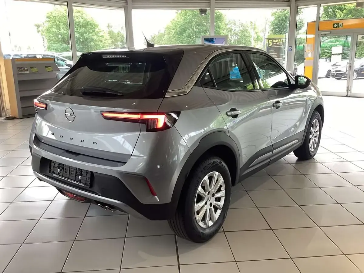 Gebraucht Opel Mokka Enjoy 131 PS (96 kW) 2023 Kontrast grau SUV