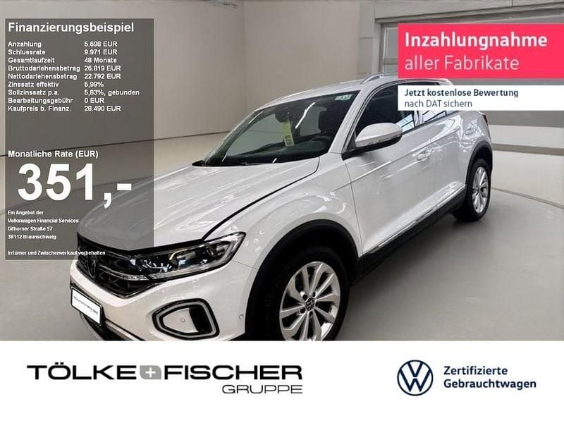 Pure white uni (metallic) Gebraucht 2024 VW T-Roc Style SUV | 28.490 € (Guter Preis) - Bild 1/2