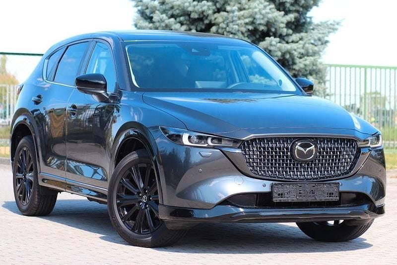 Grau Gebraucht 2024 Mazda CX-5 Exclusive-Line SUV | 30.900 € (Superpreis) - Bild 1/4