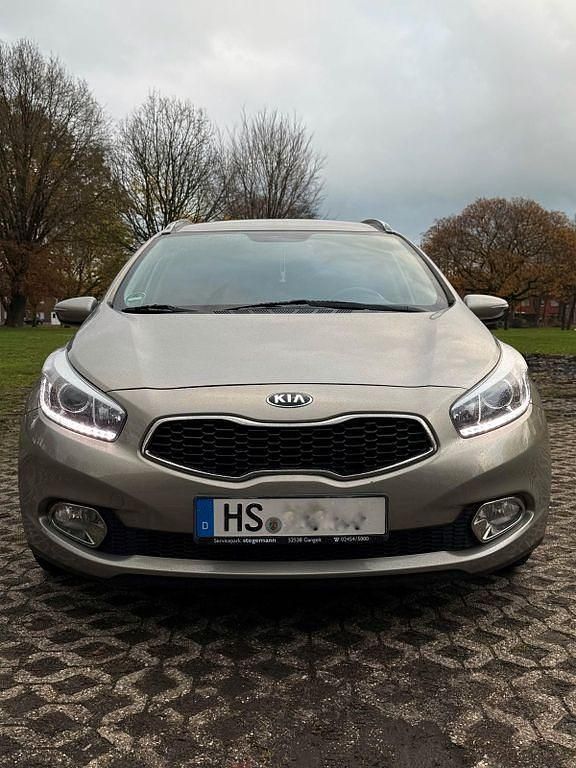 Grau Gebraucht 2013 Kia Ceed Sportswagon Kombi | 7.600 € (Fairer Preis) - Bild 1/4