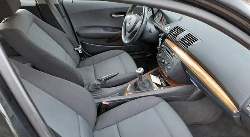 Gebraucht BMW 116 116 PS (85 kW) 2006 Schwarz Kleinwagen