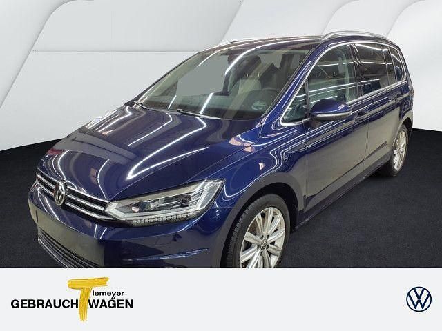 Blau Gebraucht 2024 VW Touran Highline Van / Kleinbus | 34.870 € (Fairer Preis) - Bild 1/4