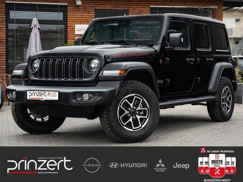 Weiß Gebraucht 2022 Jeep Wrangler Sahara SUV | 60.470 € (Teuer) - Bild 1/3