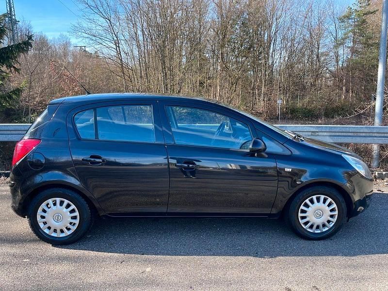 Gebraucht Opel Corsa 80 PS (58 kW) 2009 Saphirschwarz mi2 Kleinwagen