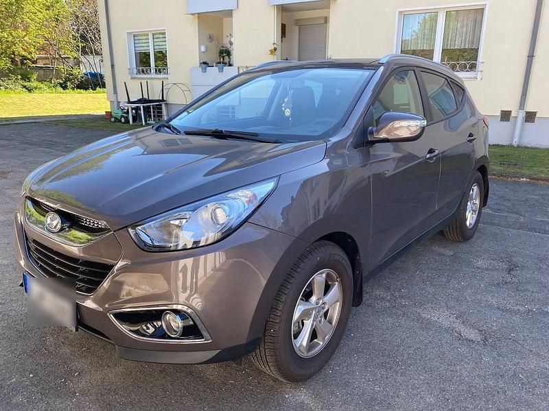 Grau Gebraucht 2012 Hyundai ix35 SUV | 11.000 € - Bild 1/4