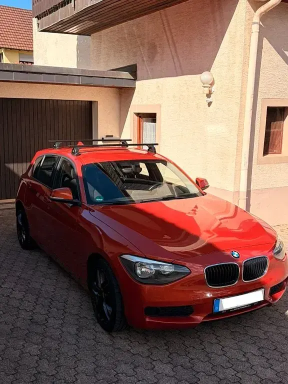 Gebraucht BMW 114 95 PS (69 kW) 2013 Orange Kleinwagen