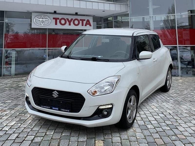 Weiss Gebraucht 2018 Suzuki Swift Basic Kleinwagen | 11.490 € (Fairer Preis) - Bild 1/4