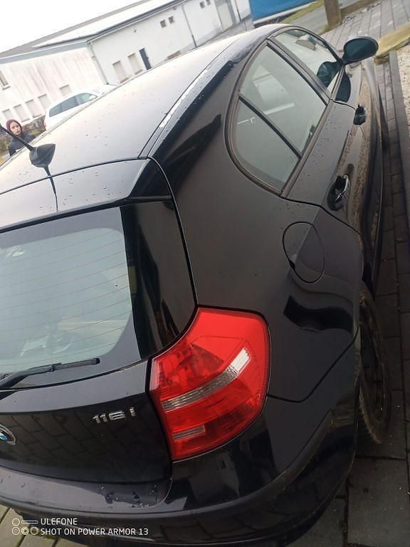 Gebraucht BMW 116 122 PS (89 kW) 2009 Schwarz Kleinwagen