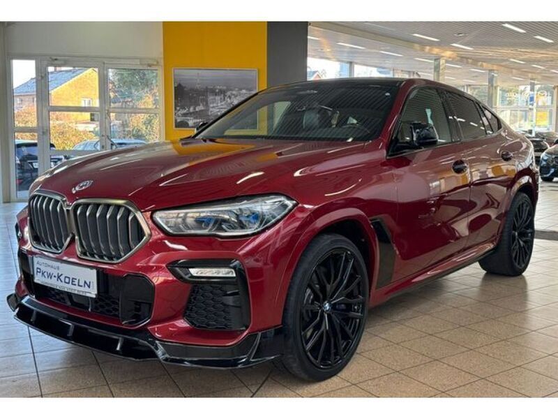 Flamencorot brillanteffekt (metallic) Gebraucht 2020 BMW X6 Shadowline SUV | 58.999 € - Bild 1/4