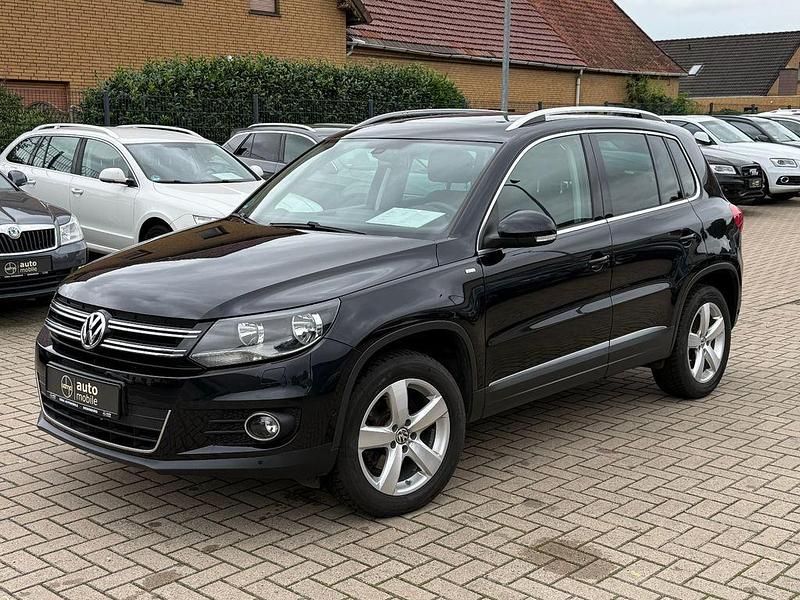Schwarz Gebraucht 2014 VW Tiguan SUV | 11.998 € (Guter Preis) - Bild 1/4