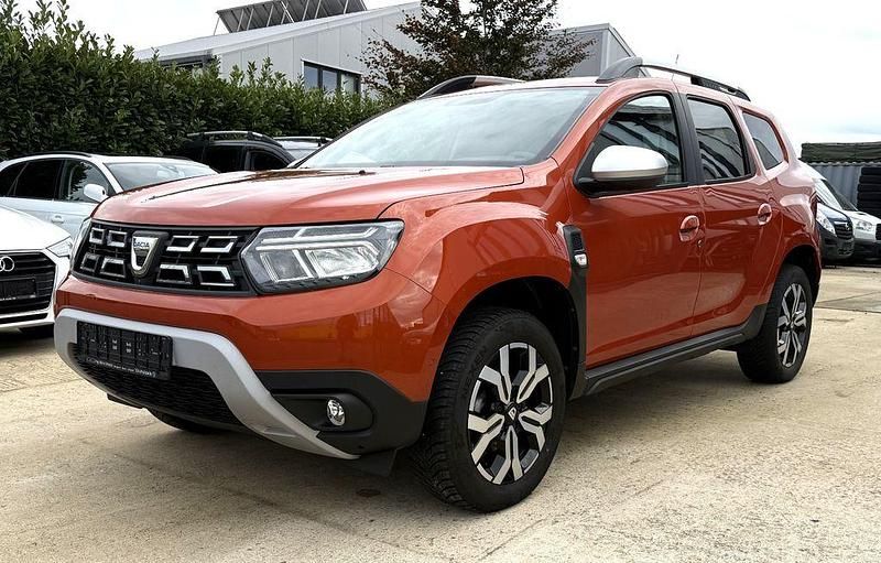 Orange Gebraucht 2022 Dacia Duster Prestige SUV | 14.950 € (Fairer Preis) - Bild 1/4