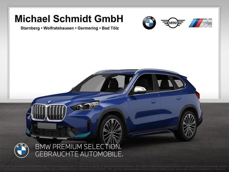 M portimao blau Gebraucht 2023 BMW iX1 M Sport SUV | 39.990 € (Superpreis) - Bild 1/4
