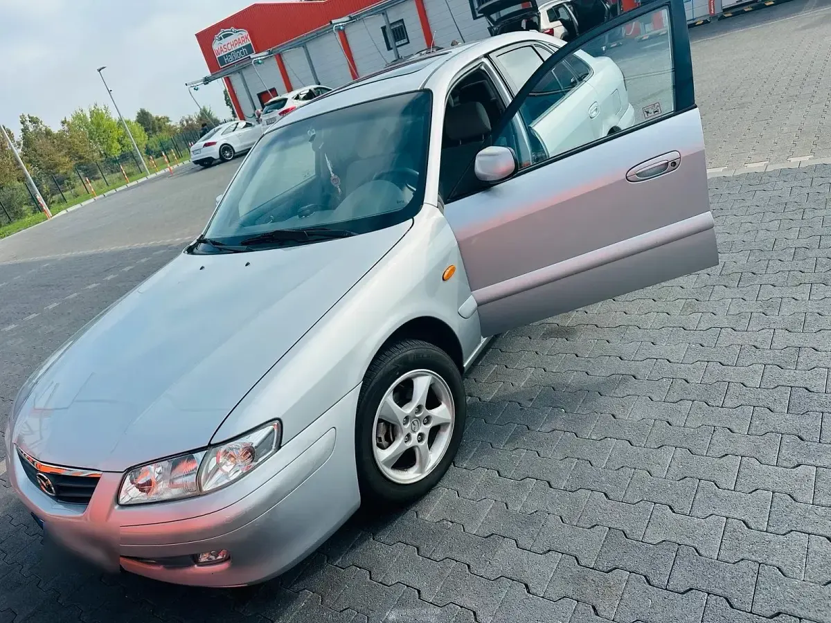 Second-hand Mazda 626 116 CP (85 kW) 2000 Argintiu Berlinǎ