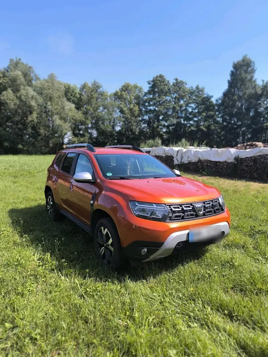 Używany Dacia Duster Extreme 91 KM (66 kW) 2022 Pomarańczowy SUV