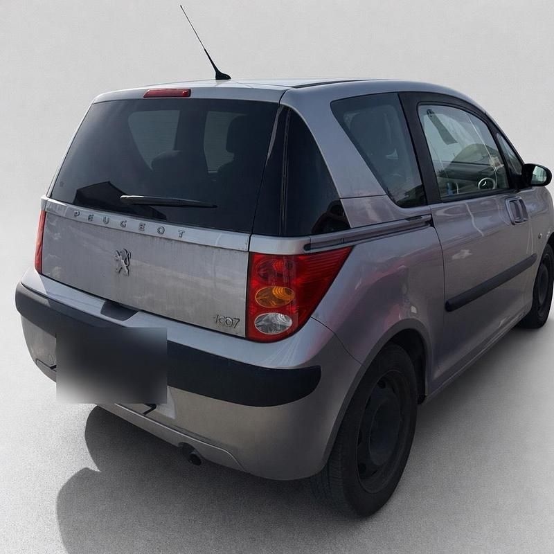 Gebraucht Peugeot 1007 Filou 68 PS (50 kW) 2006 Silber Van / Kleinbus