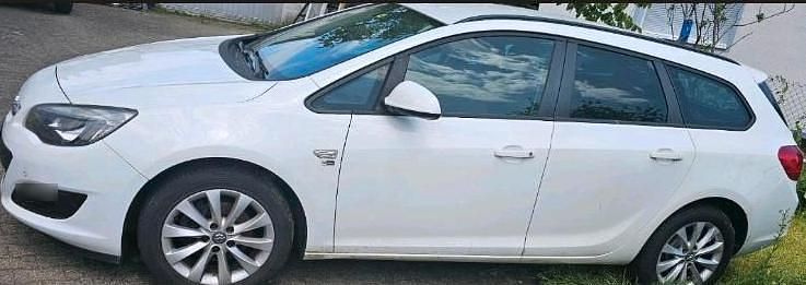 Gebraucht Opel Astra 136 PS (100 kW) 2013 Weiß Kombi