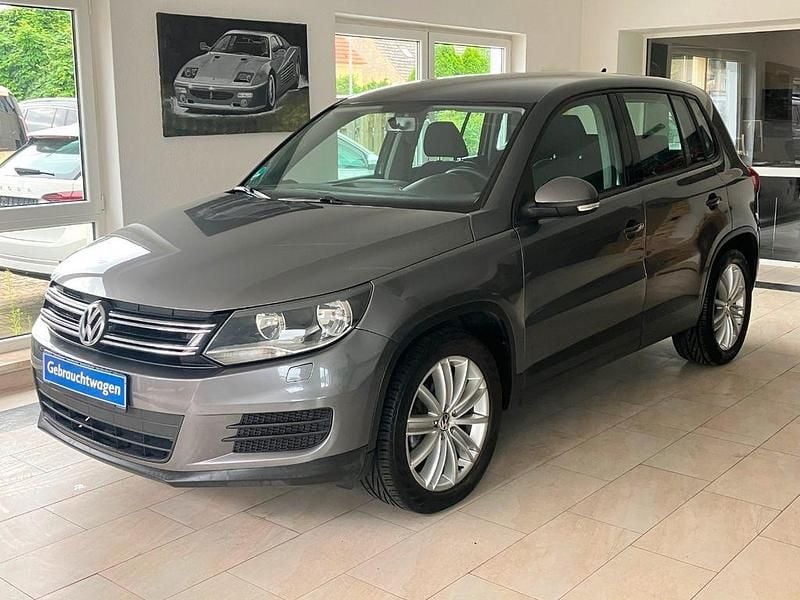 Pepper grey (metallic) Gebraucht 2014 VW Tiguan Trendline SUV | 7.890 € (Superpreis) - Bild 1/4