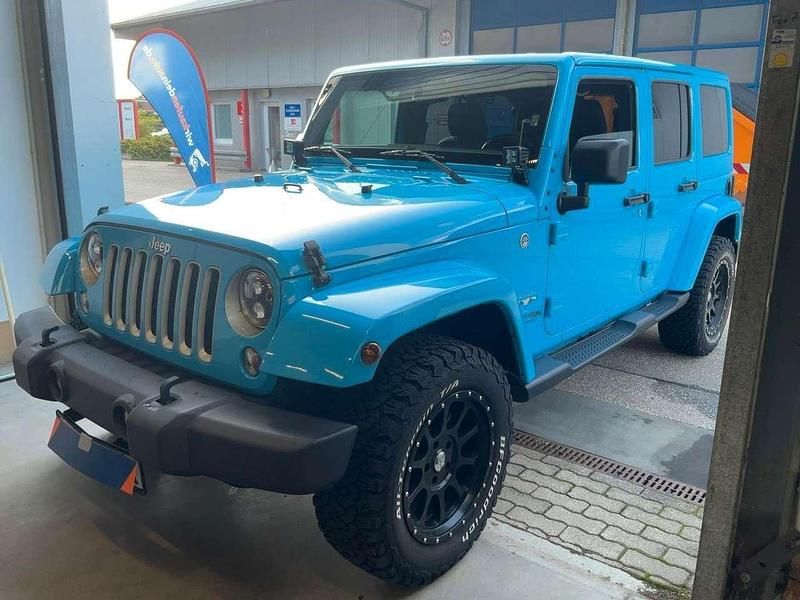 Blau Gebraucht 2019 Jeep Wrangler Unlimited Sahara SUV | 36.990 € (Fairer Preis) - Bild 1/2