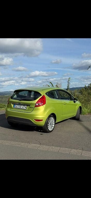 Gebraucht Ford Fiesta Titanium 97 PS (71 kW) 2011 Grün Kleinwagen