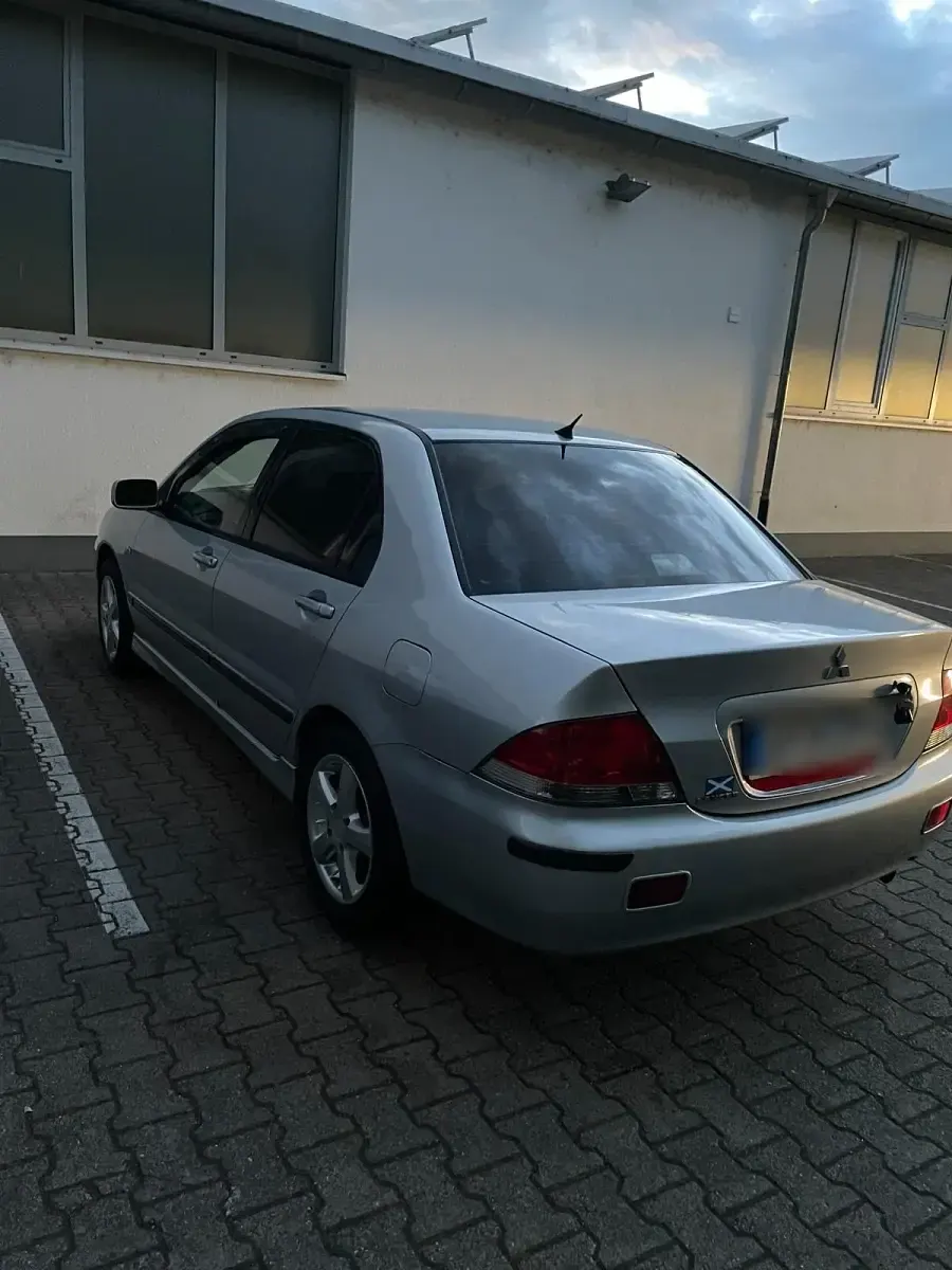 Gebraucht Mitsubishi Lancer 98 PS (72 kW) 2003 Silber Limousine