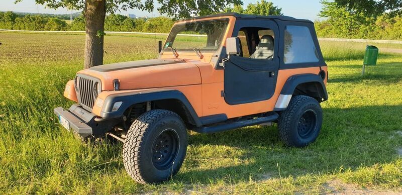 Orange Gebraucht 1998 Jeep Wrangler Sport SUV | 8.900 € (Superpreis) - Bild 1/4