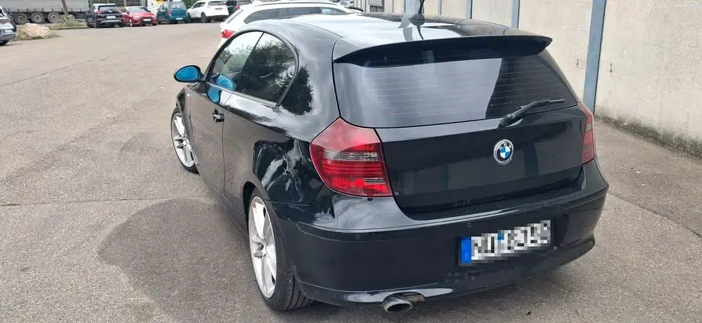 Gebraucht BMW 116 122 PS (89 kW) 2009 Schwarz Kleinwagen