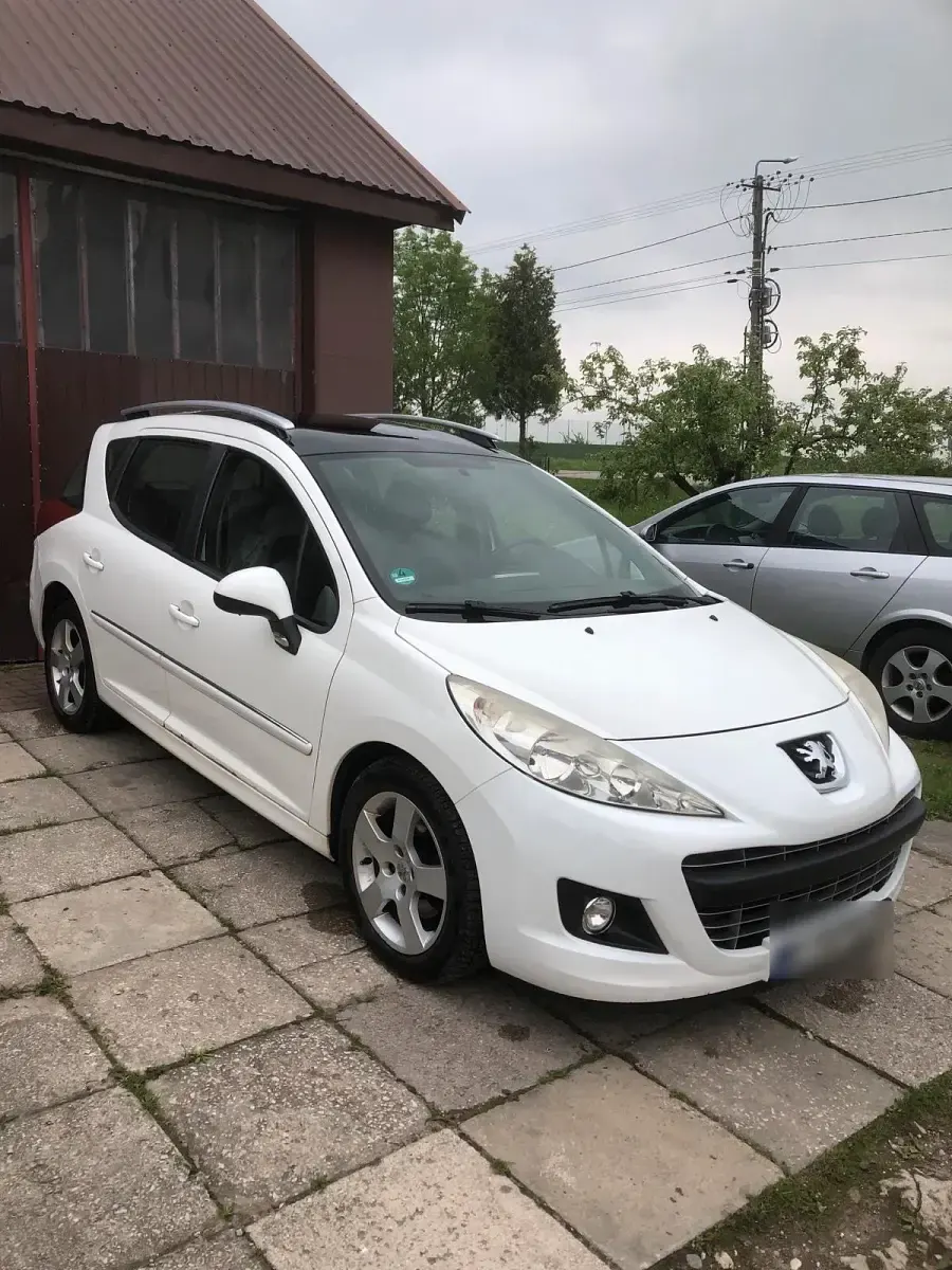 Gebraucht Peugeot 207 90 PS (66 kW) 2011 Weiß Kombi